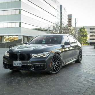 Black BMW 7-Series with Aftermarket Halo Headlights - Photo by Vorstiner