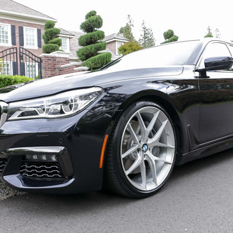 Chrome Wheels on Custom Black BMW 7-Series - Photo by Forgeline Motorsports