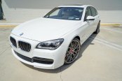 Advanced Design: White BMW 7-Series on Gunmetal Custom Wheels