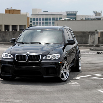 Black BMW X5 with Custom Halo Headlights - Photo by ADV.1