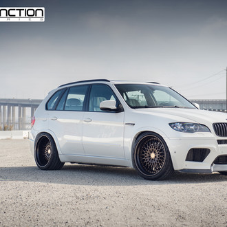 Aftermarket Front Bumper on White BMW X5 - Photo by Avant Garde Wheels