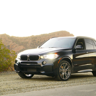 Front Bumper with Fog Lights on Black BMW X5 - Photo by Vorstiner