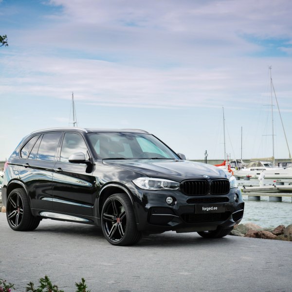 Crystal Clear Halo Headlights on Black BMW X5 - Photo by Vossen