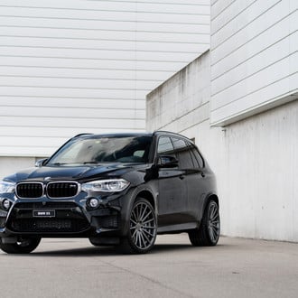 The Dark Knight's Daily Driver: Customized Black BMW X5