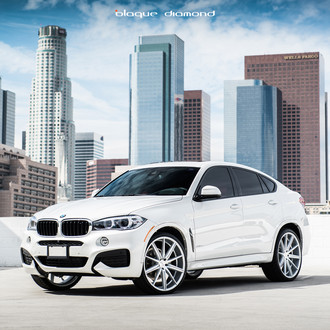 Front Bumper with LED Fog Lights on White BMW X6 - Photo by Blaque Diamond