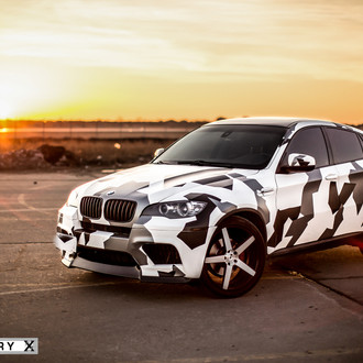 BMW X6 M with Black and White Camo Wrap on XO Luxury Rims - Photo by XO Luxury