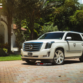 White Cadillac Escalade with Dark Smoke Headlights - Photo by Vellano
