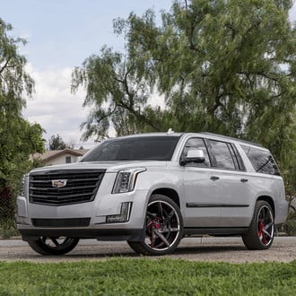 Custom LED Headlights on Gray Cadillac Escalade - Photo by Forgiato