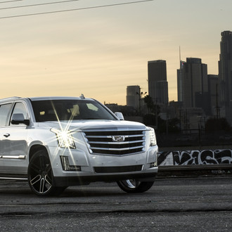 Aftermarket LED Headlights on Gray Cadillac Escalade - Photo by Blaque Diamond Wheels