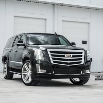 VIP Appearance of Black Cadillac Escalade Emphasized With Contrasting Chrome Elements