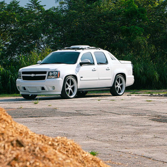 Bad Boy White Chevy Avalanche SS Customized to Stand Out