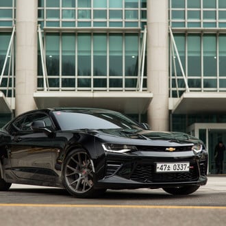 Black Chevy Camaro SS with Aftermarket Front Bumper - Photo by Vossen