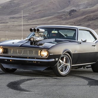 Black Chevy Camaro 383 with Yellow Headlights - Photo by Steve Temple