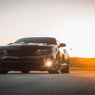 Black Chevy Camaro with Custom Hood - Photo by Vossen