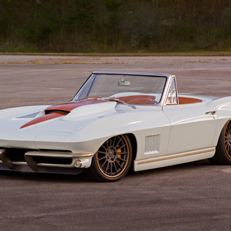 Less is More: Custom White Convertible Chevy Corvette with Orange Stripes