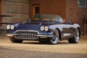 Charming Black Convertible Chevy Corvette Wearing Chrome Grille