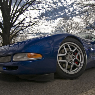 Blue Chevy Corvette with Custom Front Lip - Photo by dan kinzie