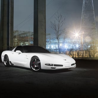 White Chevy Corvette with Dark Smoke Headlights - Photo by dan kinzie