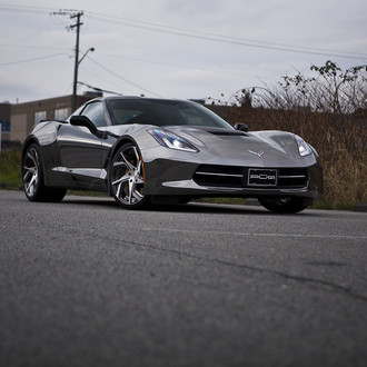 Black Ice: Sleek Gray Chevy Corvette with Custom Parts and Wheels