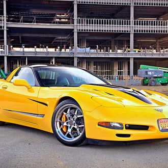 Yellow Chevy Corvette with Aftermarket Vented Hood - Photo by Scotty Lachenauer