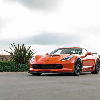 Aftermarket Vented Hood on Orange Chevy Corvette - Photo by Vorsteiner