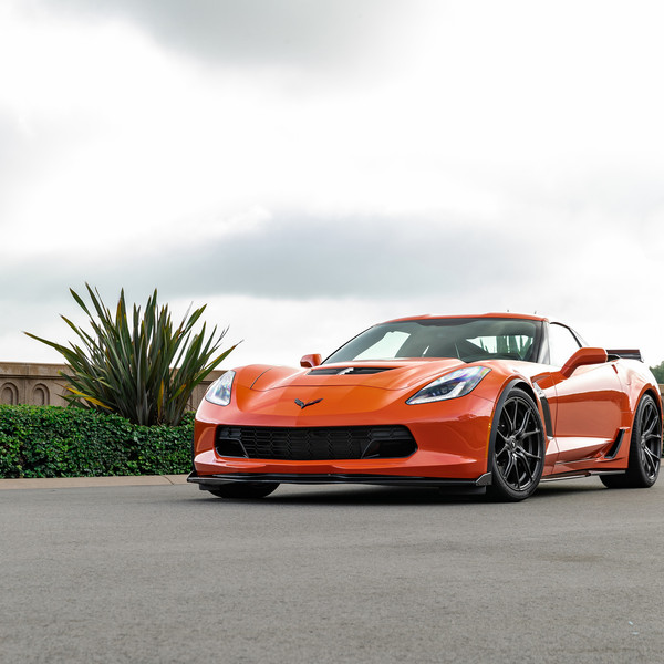 Aftermarket Vented Hood on Orange Chevy Corvette - Photo by Vorsteiner