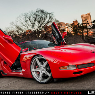 Candy Red Corvette on a set of Lexani Wheels