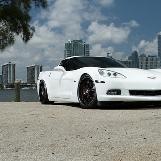 White Chevy Corvette with Custom Headlights - Photo by Vossen