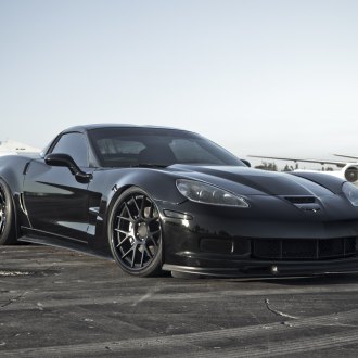 Visual 'Ground Hugging' Effect of Custom Lowered Black Chevy Corvette ...