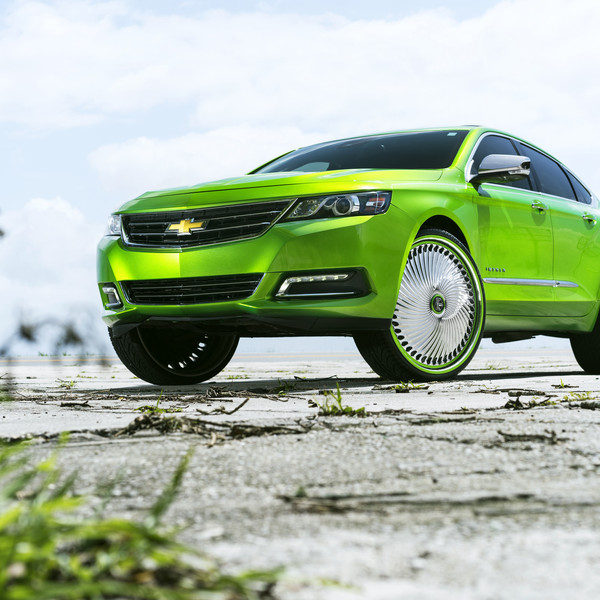 Custom Chrome DUB Wheels on Green Chevy Impala - Photo by DUB