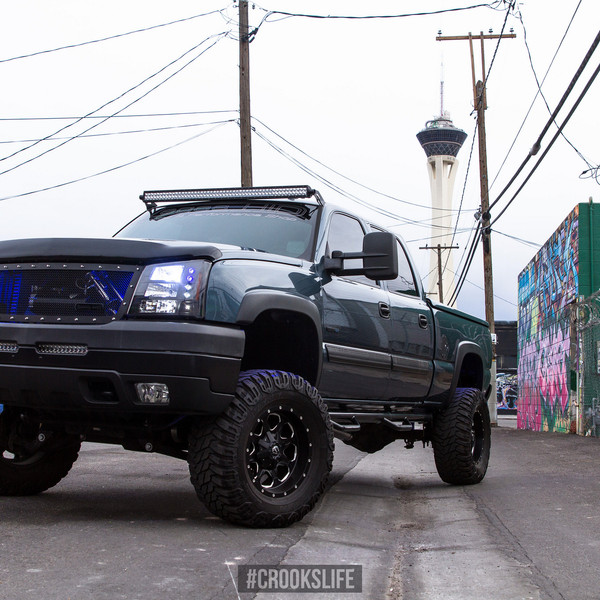 Lifted Chevy Silverado with Custom Rims - Photo by Jimmy Crook