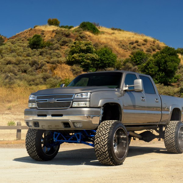 Gray Metallic Chevy Silverado with Custom Chrome Grille - Photo by Fuel Offroad