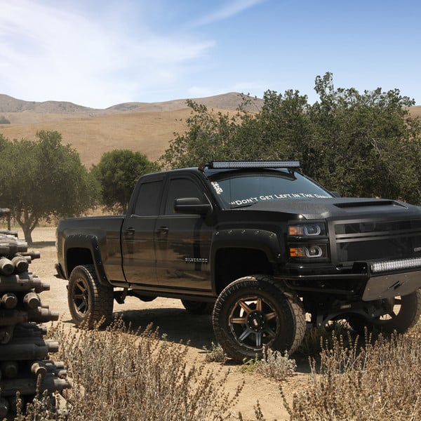 Front Bumper with LED Light Bar on Black Chevy Silverado - Photo by Grid Off-Road