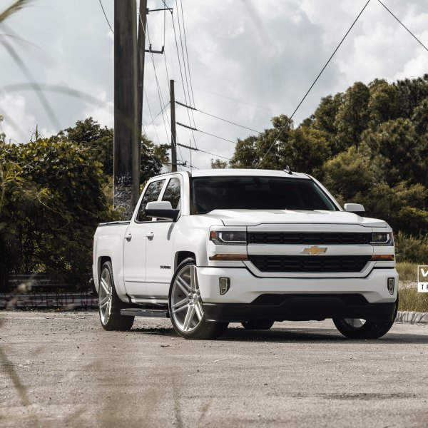 White Chevy Silverado with Aftermarket Projector Headlights - Photo by Velgen Wheels