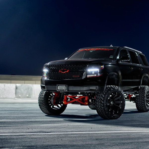 Insane Lifted Chevy Tahoe on Huge Wheels - Photo by Jason Scott