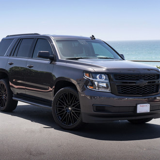 Black Chevy Tahoe with Custom Projector Headlights - Photo by Black Rhino