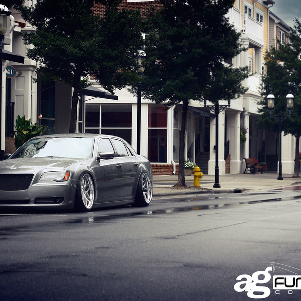 Gray Stanced Chrysler 300 with Aftermarket Headlights - Photo by Avant Garde Wheels