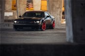 Blacked Out and Stanced Dodge Challenger SRT Benefits From Custom Red Wheels