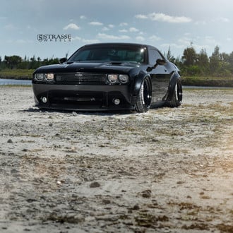 Stanced Out Black Dodge Challenger Stands Out with Gloss Blue Strasse Rims
