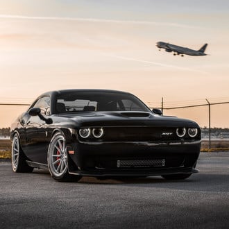 Aftermarket Vented Hood on Black Dodge Challenger SRT - Photo by Vossen