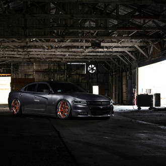 Slammed Charger on Gold Custom Rims - Photo by Avant Garde