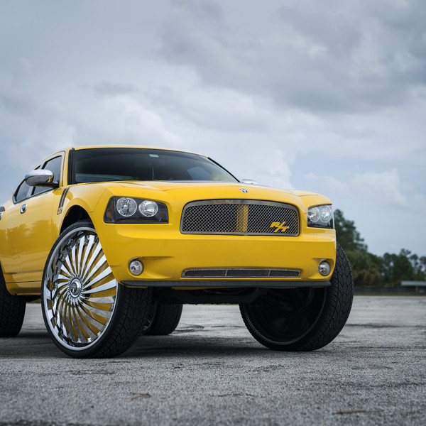Custom Swyrl DUB Rims on Yellow Dodge Charger Daytona - Photo by DUB