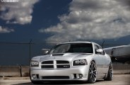 Custom Silver Dodge Charger Next to the Word Amazing in the Dictionary