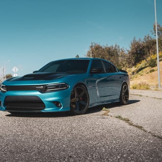 Dark Smoke Headlights on Turquoise Dodge Charger - Photo by Blaque Diamond Wheels