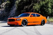 Bright Orange Dodge Charger with Contrasting Black Accents