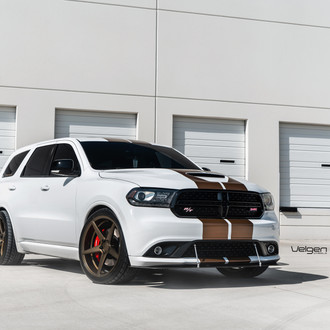White Dodge Durango Outfitted with Bronze Strips and Bronze Velgen Rims