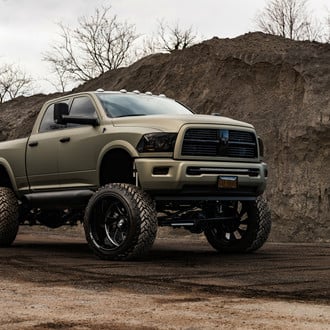Custom Lifted Dodge Ram on Black Forged Custom Wheels - Photo by Fuel Off-Road
