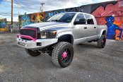 Stylish Lifted Gray Dodge Ram Featuring Pink Accents