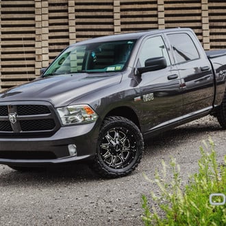 Custom Headlights on Gray Dodge Ram 1500 - Photo by Onyx Offroad