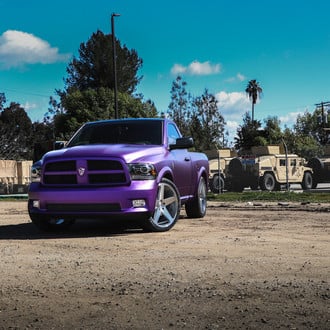 Aftermarket Headlights on Matte Purple Dodge Ram - Photo by Blaque Diamond Wheels